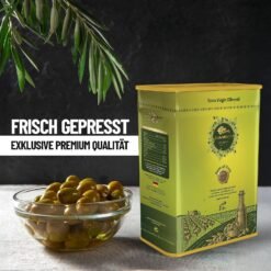 Elea Minon Olivenöl Kanister neben einer Schale frischer Oliven
